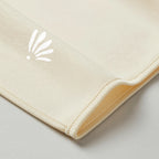 Emblème Belqia au coin du foulard, bamboo jersey crème