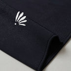 Emblème Belqia au coin du foulard, liquid jersey noir